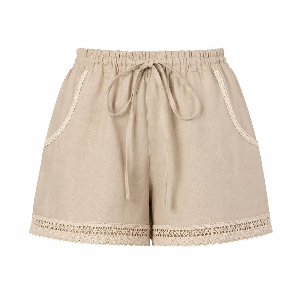 ALURE Beige Linen Shorts, luxury linen resort wear for women, elegant summer shorts with crochet lace details and relaxed silhouette by BILEYA COUTURE.