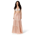 ALURE PEACH Linen Long Skirt by BILEYA COUTURE crafted from 100% natural linen, featuring a flowing three-tiered silhouette, crochet lace details, elasticated waistband, and elegant maxi length for luxury designer resort wear styling.
