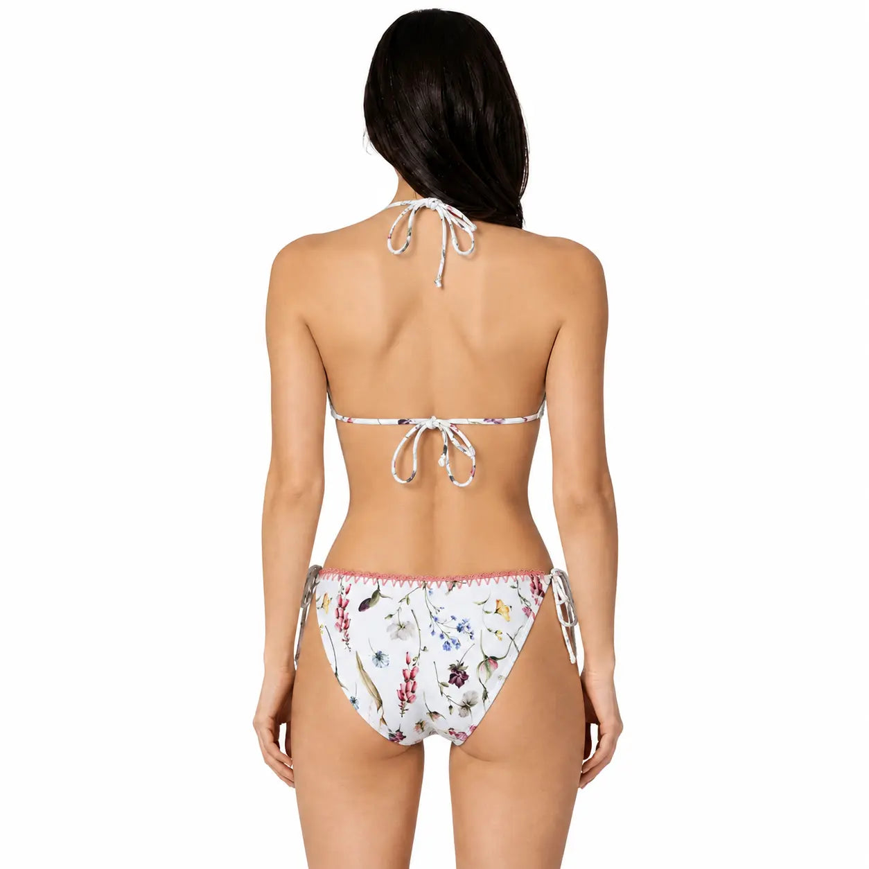 Woman wearing a floral bikini on a white background bileya couture