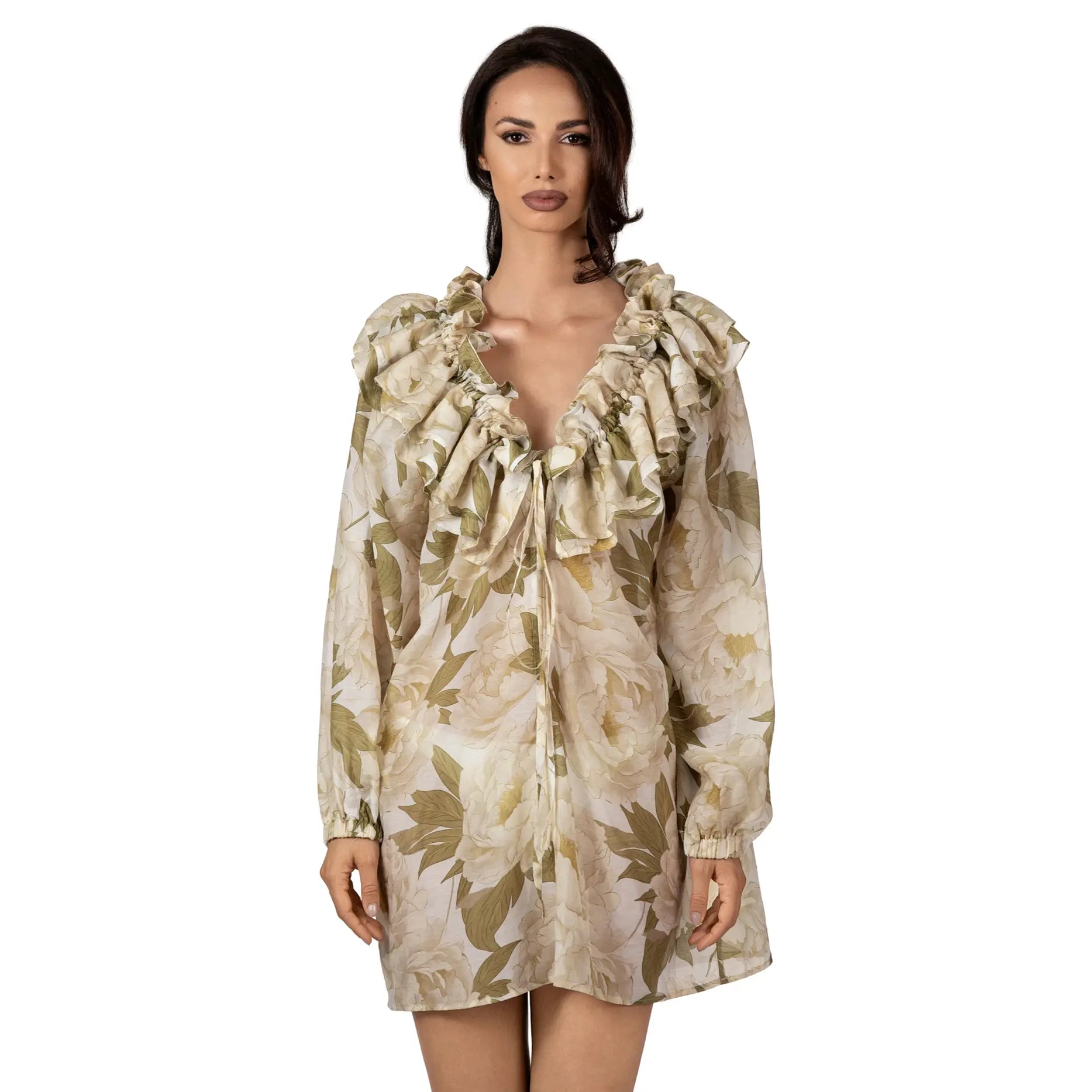 FLEUR DE LUMIÈRE Long Sleeve Top by BILEYA COUTURE crafted from luxurious silk-cotton chiffon, featuring a romantic white floral print, elegant ruffle neckline, adjustable front ties, long sleeves with elastic cuffs, and an airy designer resort wear silhouette.
