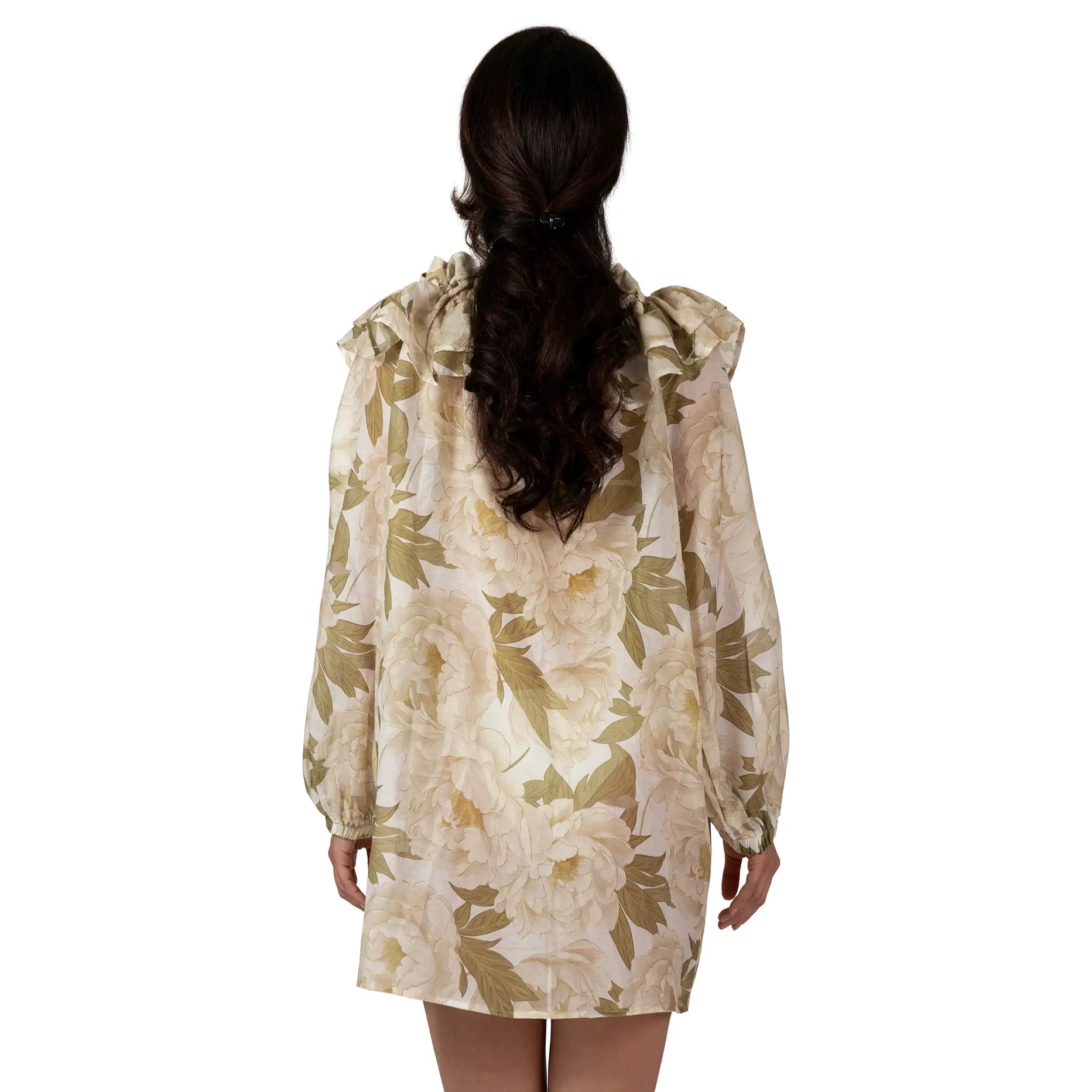 FLEUR DE LUMIÈRE Long Sleeve Top by BILEYA COUTURE crafted from luxurious silk-cotton chiffon, featuring a romantic white floral print, elegant ruffle neckline, adjustable front ties, long sleeves with elastic cuffs, and an airy designer resort wear silhouette.
