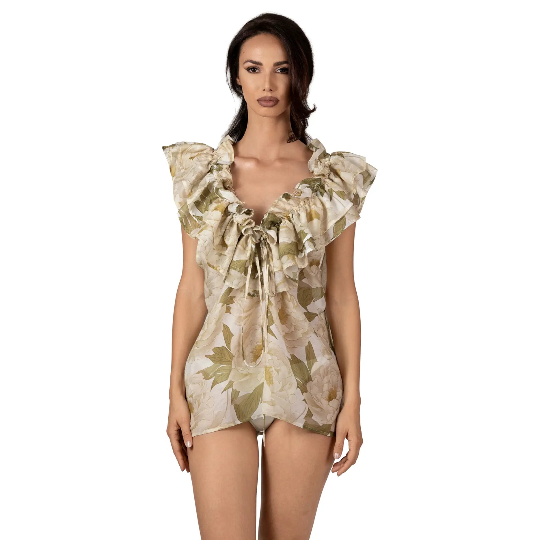 FLEUR DE LUMIÈRE Sleeveless Top by BILEYA COUTURE crafted from luxurious silk-cotton chiffon, featuring a romantic white peony floral print, voluminous ruffle neckline, adjustable front ties, and an elegant designer resort wear silhouette on a white background.