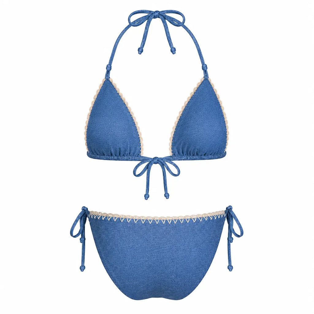 AMAYA COUTURE JEANS STYLE bikini set by BILEYA COUTURE featuring a luxury blue textured triangle bikini top with handcrafted beige trim and matching tie-side bikini bottoms.