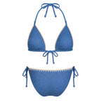 AMAYA COUTURE JEANS STYLE bikini set by BILEYA COUTURE featuring a luxury blue textured triangle bikini top with handcrafted beige trim and matching tie-side bikini bottoms.