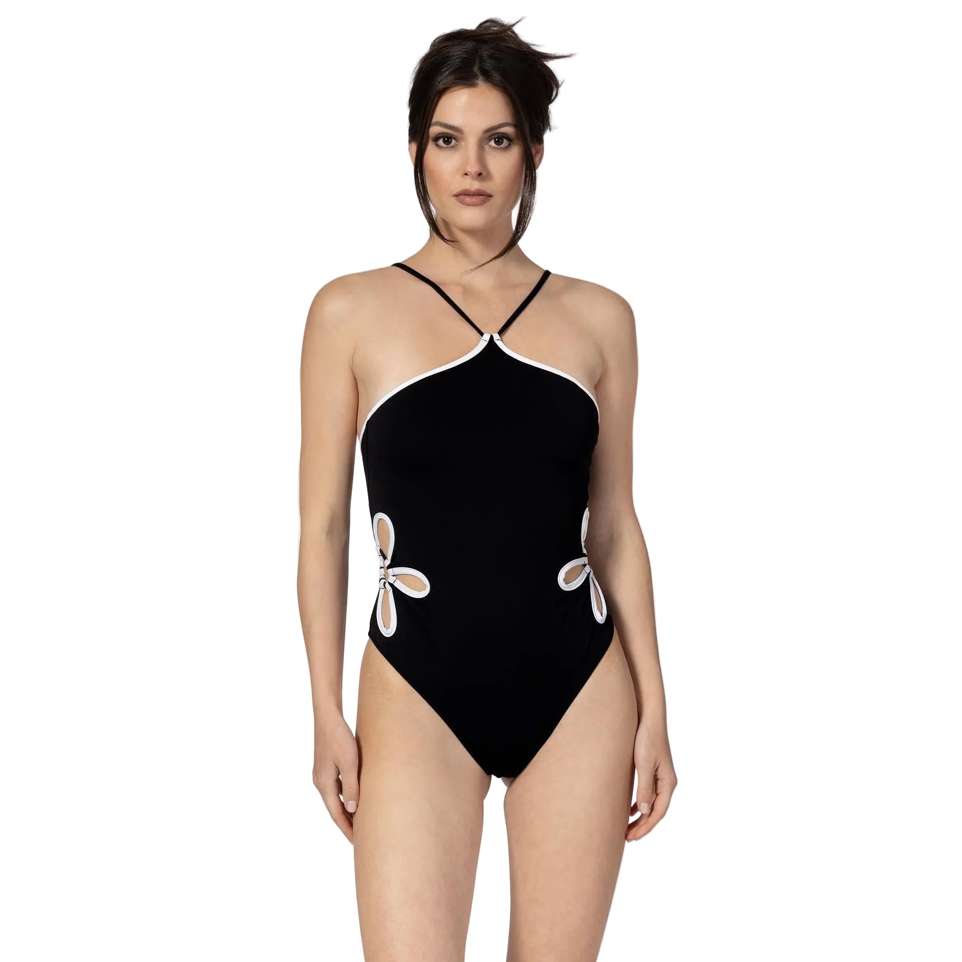 Woman wearing a black one-piece swimsuit with white floral designs on a white background