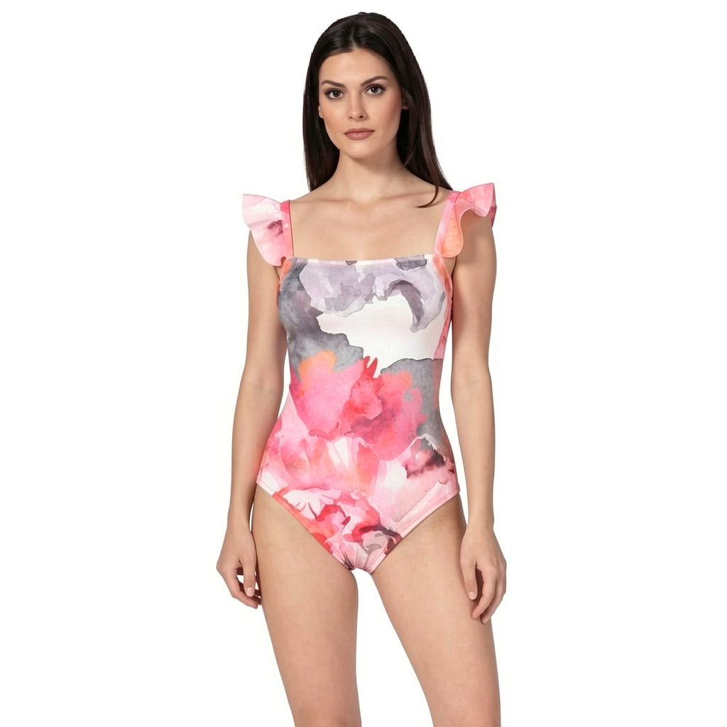 Woman wearing a colorful floral swimsuit on a white background