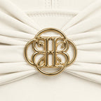 BILEYA COUTURE DONNA WHITE gold logo detail showcasing premium craftsmanship and luxury swimwear design