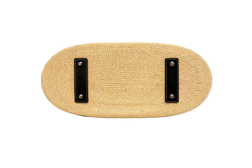 Beige woven mat with black straps by BILEYA COUTURE
