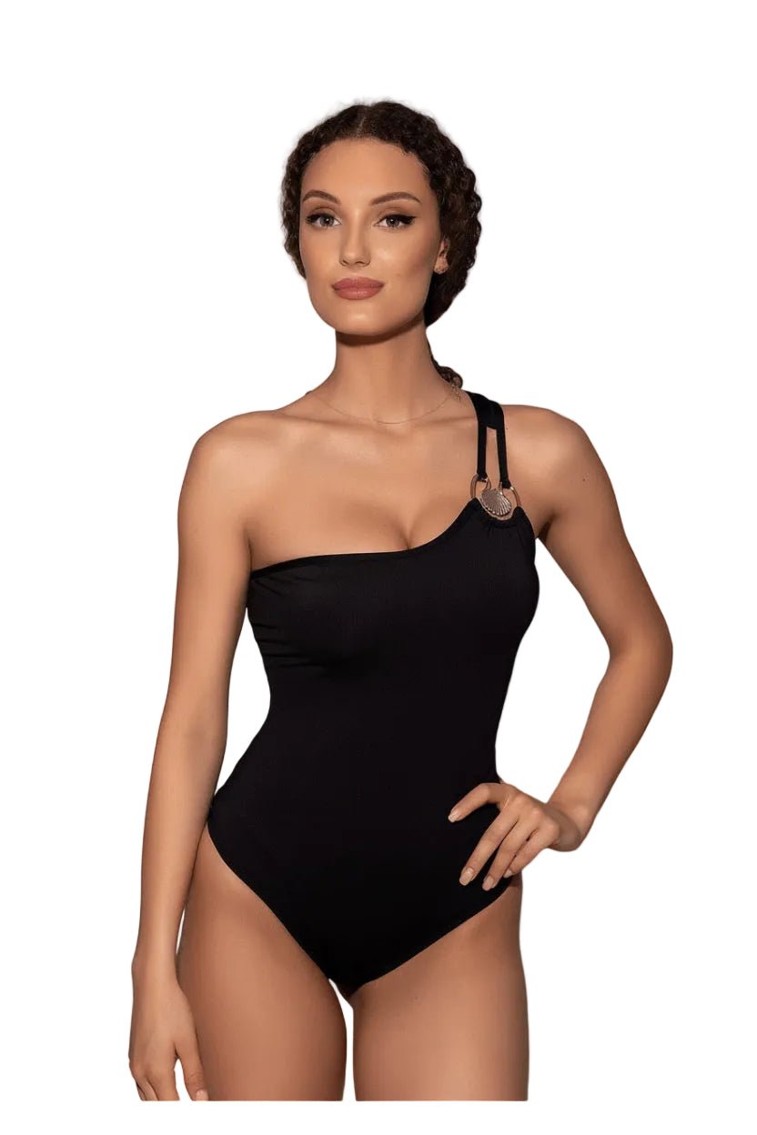 Woman wearing a black one-shoulder swimsuit on a white background