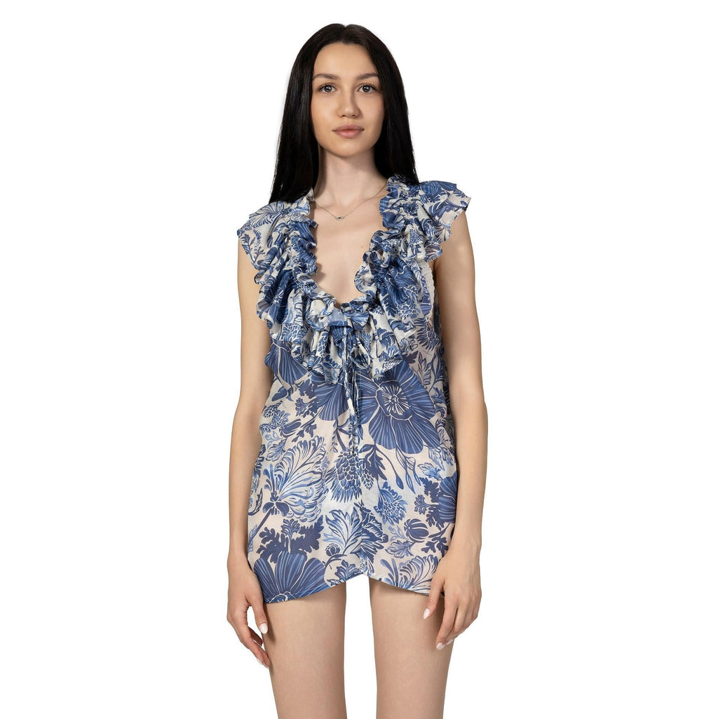 MORGANA Sleeveless Resort Top by BILEYA COUTURE featuring blue floral print, ruffled neckline, and luxurious silk chiffon fabric